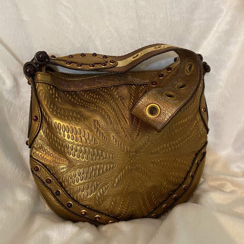 A rare gold Gucci bag